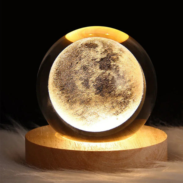 "3D crystal moon lamp LED night light for bedroom and home decor, featuring a spherical crystal ball with moon design inside."